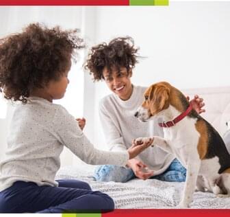 Woman and child with dog
